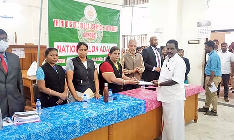 தேசிய மக்கள் நீதிமன்றத்தில் பயனாளி ஒருவருக்கு தீர்வு காணப்பட்டது.