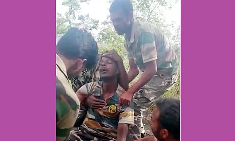 காட்டுத்தீயை அணைக்க முயன்ற வேட்டை தடுப்பு காவலர் பாறையில் தவறி விழுந்து படுகாயம்- சுயநினைவை இழந்து ஆஸ்பத்திரியில் அனுமதி