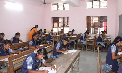 மீனாட்சிபுரம் பெண்கள் மேல்நிலைப்பள்ளியில் பிளஸ்-1 தேர்வு எழுதிய மாணவிகள்.