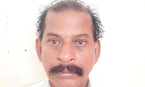 கைது செய்யப்பட்ட ஆறுமுகம்.