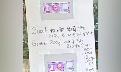 ரூ.2 ஆயிரம் நோட்டுக்கு சலுகை அறிவித்த டெல்லி வியாபாரி