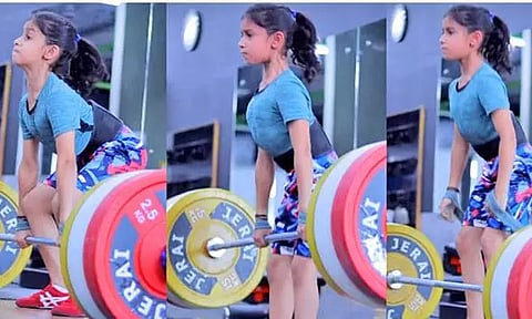 ஒலிம்பிக் போட்டியில் பங்கேற்க ஆர்வம்- 60 கிலோ எடையை தூக்கி அசத்தும் 8 வயது சிறுமி