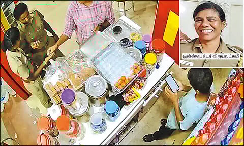 கடையில் ஜூஸ், சாண்ட்விச் கேட்டு வாக்குவாதத்தில் ஈடுபட்ட ஏட்டு, மற்றும் போலீஸ்காரரை படத்தில் காணலாம்.