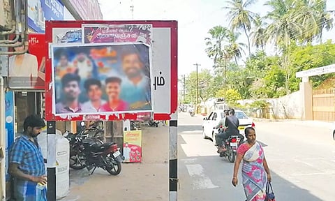 ஊர் பலகையில் ஒட்டப்பட்டுள்ள சுவரொட்டிகள்.