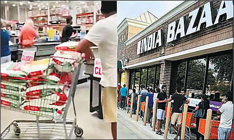 அரிசி பைகளை வாங்கி அடுக்கியிருக்கும் வாடிக்கையாளரையும், அரிசி வாங்க கடைக்கு வெளியே வரிசையில் காத்திருக்கும் இந்தியர்களையும் படத்தில் காணலாம்.