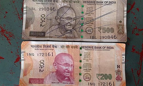 வணிக நிறுவனங்கள், பெட்ரோல் பங்குகளை குறி வைத்து கள்ள நோட்டை புழக்கத்தில் விடும் கும்பல்