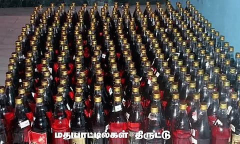 சுவரில் துளையிட்டு ரூ.21 ஆயிரம் மதுபாட்டில்கள் திருட்டு