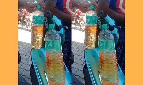 மழையால் பெட்ரோல் பங்க் டேங்கில் நீர் கசிந்தது- தண்ணீர் கலந்த பெட்ரோல் வினியோகத்தால் வாகனங்கள் பழுது