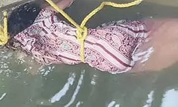 ஆற்றில் பிணமாக மிதந்த பெண் பிணம்