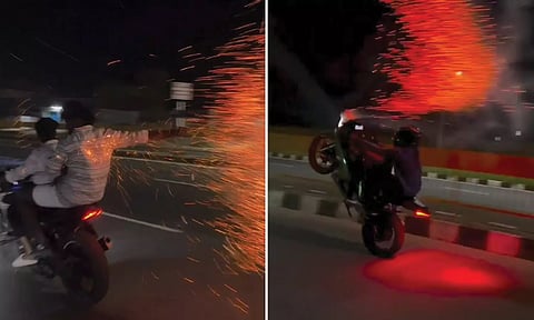 சென்னை-பெங்களூரு தேசிய நெடுஞ்சாலையில் பைக்கில் பட்டாசு வெடித்து சாகசம் செய்த வாலிபர்கள்