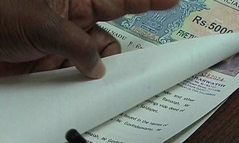 போலி ஆவணங்கள் தயாரித்து பெண்ணிடம் ரூ. 18 லட்சம் நில மோசடி