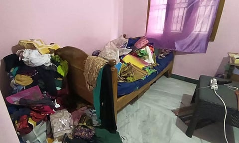 திட்டக்குடியில் கோர்ட் பெண் காவலாளி வீட்டில் நகை -பணம் கொள்ளை