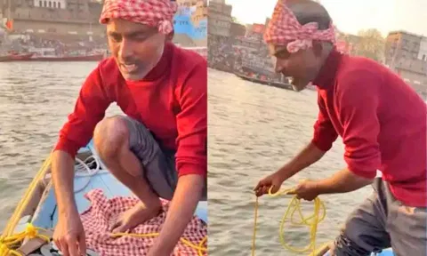 கங்கை நதியில் காந்தத்தை வீசி நாணயங்களை அள்ளும் வாலிபர்