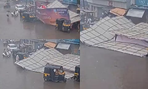 மழைக்கு ஒதுங்குனது ஒரு குத்தமா?.. சூறைக் காற்றில் விளம்பரப் பலகை சரிந்து விபத்து.. வீடியோ