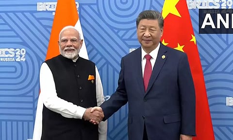 ரஷியாவில் பிரிக்ஸ் உச்சி மாநாடு: சீன அதிபர் ஜின்பிங்குடன் பிரதமர் மோடி பேச்சுவார்த்தை