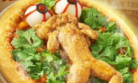 சீன உணவகத்தில் விற்பனையாகும் தவளைக்கறி பீட்சா