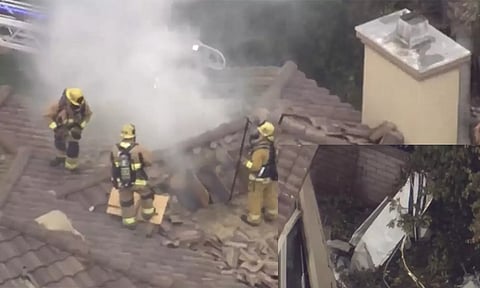 கலிபோர்னியாவில் குடியிருப்புகள் மீது விமானம் விழுந்து நொறுங்கியது- விமானி பலி