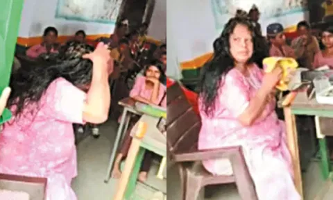 VIDEO: வகுப்பறையில் பாடல் கேட்டபடியே தலைமுடிக்கு எண்ணெய் தேய்த்த ஆசிரியை சஸ்பெண்ட்