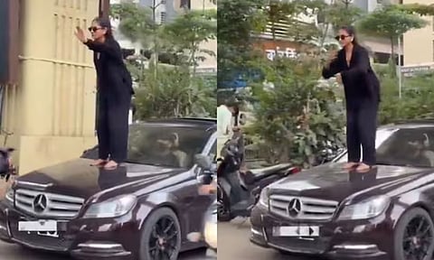 ஓடும் காரின் மேல் ஏறி நடனமாடிய இளம்பெண் மீது வழக்குப்பதிவு