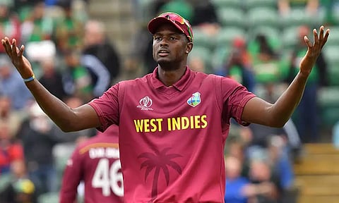 டி20 கிரிக்கெட்டில் அதிக விக்கெட் : பிராவோ சாதனையை முறியடித்த ஹோல்டர்