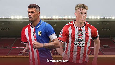 Granit Xhaka in a 50-50 Sunderland and Chelsea kit, with Dan Ballard alongside him and the Stadium of Light in the background