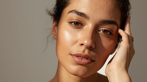 Salicylic acid skincare routine for oily and acne-prone skin with visible natural skin texture.