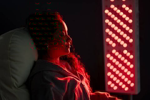 RLT exposes an individual’s body to low wavelength red light that pierces the skin cells and may enhance production of adenosine triphosphate production for cellular repair.