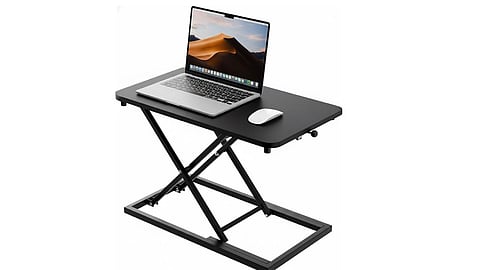 Practical work from home setup essentials include a laptop stand, chair and desk accessories for better comfort.