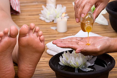 Oiling your feet can calm your mind down, slow down the heart rate, and give you this heavy, deep, snug feeling of feeling safe and secure.