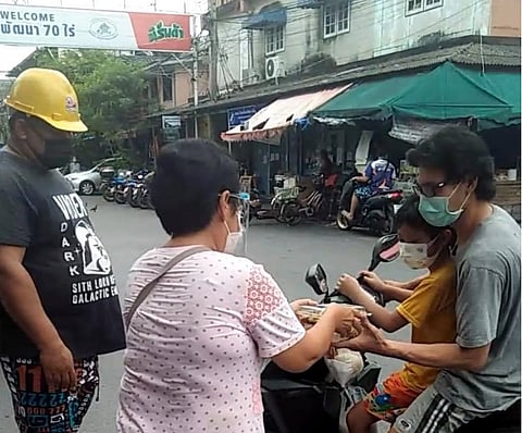 TIYAA food drive begins, few hundred meals donated to communities in Khlong Toey