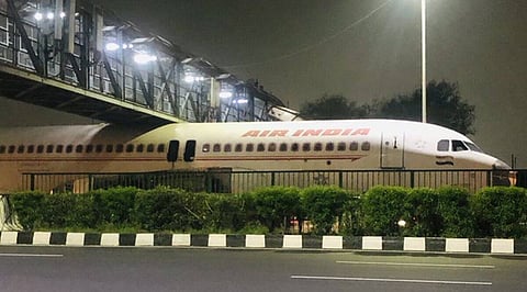 Viral video shows Air India plane stuck under foot overbridge near Delhi airport