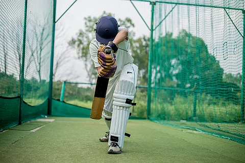 Front view of Cricket Batsman Action, Cricket game closeup player batting ball