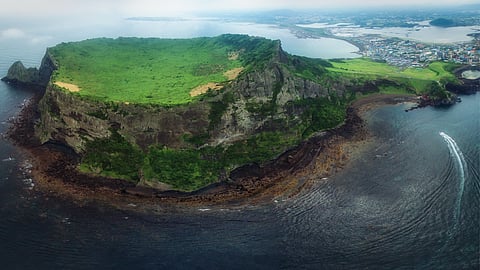 Journey through Jeju Island’s stunning landscapes, ancient culture, and tangy delights.