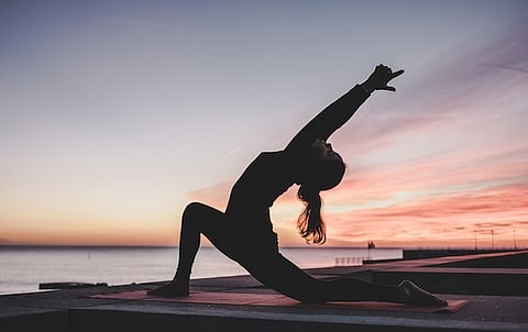 Reading a book, doing yoga are ways of lowering dementia risk (Unsplash)