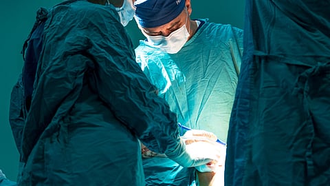 Doctors performing surgery.