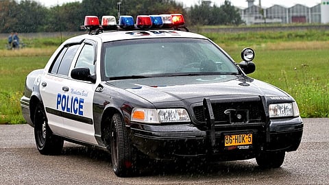 The couple was peacefully on their way home when they were stopped by two policemen. The policemen accused the couple of walking on the streets after 11 pm.