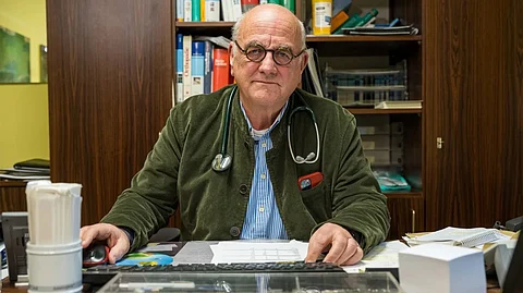 Germany’s limits on how much patients pay out-of-pocket at the doctor’s office have been critical to ensuring people get needed care, especially in a mining region where many battle lung diseases and chronic pain, says Dr. Eckart Rolshoven. “We had an industry with a lot of illnesses,” he says.