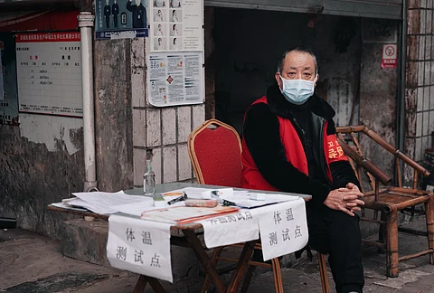 These members of residents committees are responsible for monitoring & tracing sick residents and enforcing quarantines, as well as administering vaccines and achieving centrally set vaccination targets.(Representational Image : Unsplash)