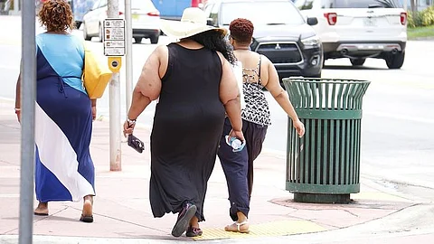 From mid-life on, carrying excessive weight, including a belly bulge, is associated with an increased risk of physical weakness in old age