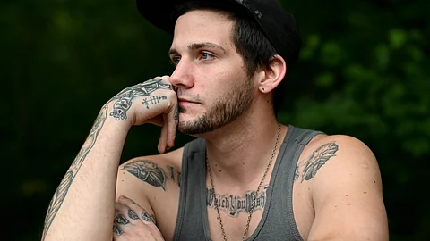 Adam Caprioli of Long Pond, Pennsylvania, was jailed in Monroe County Correctional Facility after calling 911 during a panic attack. When his anxiety increased in jail, Caprioli says, he begged for medical attention, then he began to hurt himself.
