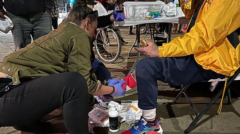 Stephanie Klipp, a wound care nurse, treats people's xylazine ulcers in Philadelphia’s Kensington neighborhood, where maintaining hygiene is an issue for those living on the streets.