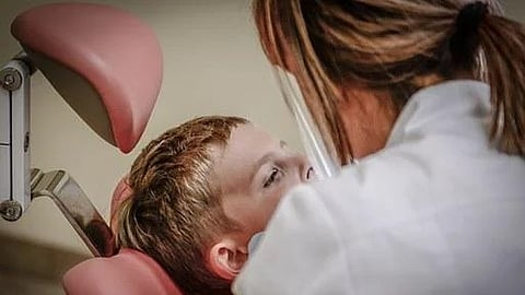 The coalition now sends a van outfitted with dental equipment to county schools to treat hundreds of students per stop a few times each year