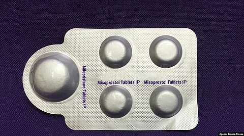 This image, courtesy of Plan C, shows a combination pack of mifepristone, left, and misoprostol tablets, two medicines used together to induce abortion, May 8, 2020.