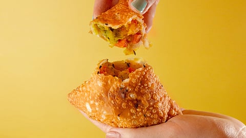 The Kaushal Sweets family, which has been in the sweet business for over 60 years, decided to make a giant 4 kg samosa in July last year. (Unsplash)