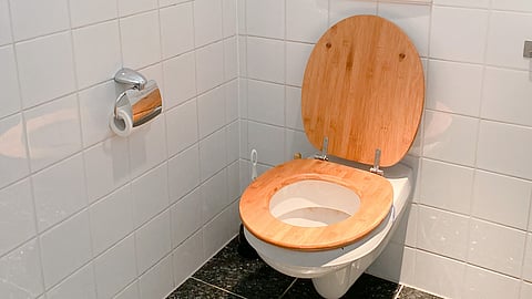 When an open toilet is flushed, small amounts of faeces and faeces-borne germs can be expelled up to 15 feet (5.5 meters). (Unsplash)