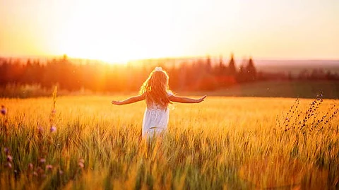 Vacation, sunshine, and time spent with family and friends are great, but they don’t necessarily guarantee a “happy” summer, says happiness experts.(Unsplash)