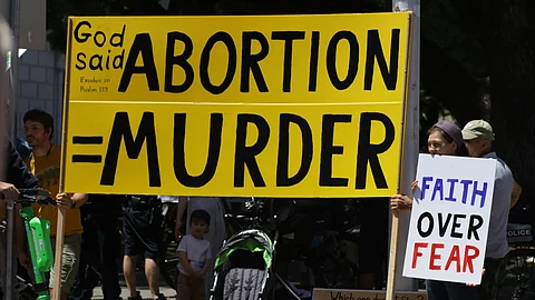 This summer pedestrians, drivers, and passengers in Washington, D.C., saw a new type of graffiti among the usual urban scrawls: anti-abortion advocacy designed to troll this ultra-blue city. (Representational Image: Unsplash)