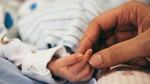 A woman delivered her baby at the gate of the District Women’s Hospital in Uttar Pradesh's Badaun after its staff allegedly refused to admit her as she did not have money to pay the fees (Representational image : Unsplash)