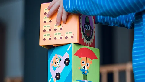 According to an October report that Smith co-authored, there is a 35% gap between the need for and availability of child care programs in rural areas. (Representational Image: Unsplash)