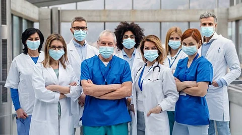 More U.S. hospitals are requiring masks and limiting visitors as health officials face an expected but still nasty post-holiday spike in flu, COVID-19. (Representational Image: Unsplash)